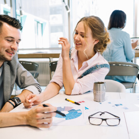 two persons discussing about digital marketing strategies