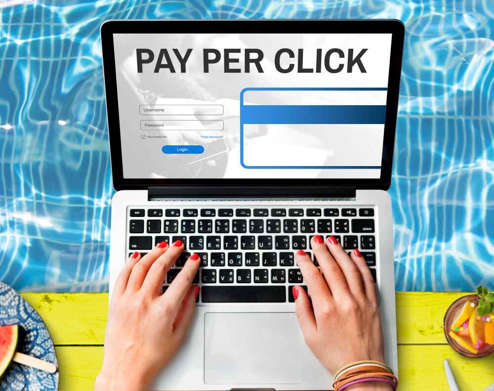 A person searching the benefits of pay per click marketing services